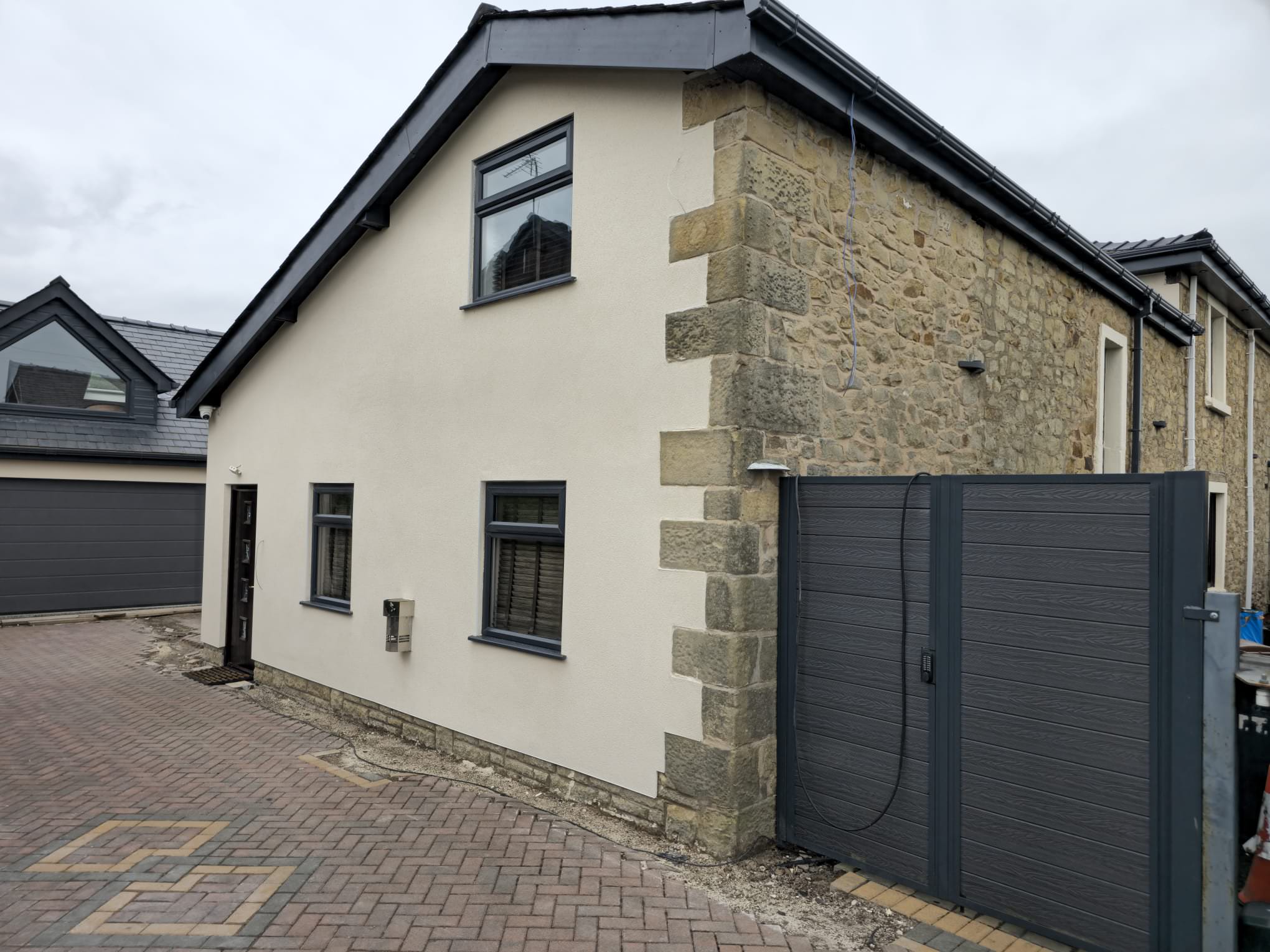 Exterior wall home rendering in Preston using monocouche